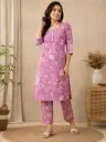 Mauve-pink with all-over white floral and leaf motifs.